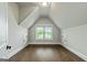 Finished attic space with hardwood floors, window and built-in storage at 120 Lapis Lake Pt, Fayetteville, GA 30215