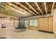 Unfinished basement with a trampoline and window at 120 Lapis Lake Pt, Fayetteville, GA 30215