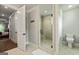 Bright bathroom offers a walk-in shower and a separate toilet area, perfect for privacy at 120 Lapis Lake Pt, Fayetteville, GA 30215