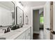 Stylish bathroom featuring dual sinks, black hardware, and plenty of counter space at 120 Lapis Lake Pt, Fayetteville, GA 30215