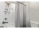 Bathroom with a bathtub-shower combo, offering functionality and style at 120 Lapis Lake Pt, Fayetteville, GA 30215