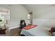 Bedroom with hardwood floors and vaulted ceiling, offering ample space at 120 Lapis Lake Pt, Fayetteville, GA 30215