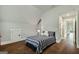Bedroom featuring hardwood floors and sloped ceiling at 120 Lapis Lake Pt, Fayetteville, GA 30215