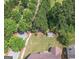 An aerial shot that shows trees, yard, home, and shed at 474 Strawberry Walk, Loganville, GA 30052