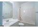 Clean bathroom with a shower-tub combo, modern fixtures, and a spacious vanity at 474 Strawberry Walk, Loganville, GA 30052