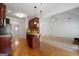 Bright kitchen seamlessly connected to living area, great for entertaining and Gathering life at 474 Strawberry Walk, Loganville, GA 30052