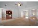 Open-concept living area with seamless flow to the kitchen and dining spaces at 474 Strawberry Walk, Loganville, GA 30052