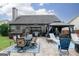 Spacious backyard with a patio featuring a gazebo, hot tub, and outdoor seating, perfect for entertainment at 2256 Long Bow Chase Nw, Kennesaw, GA 30144