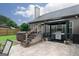 Backyard with a patio featuring a gazebo, grill, and hot tub, perfect for entertaining and relaxation at 2256 Long Bow Chase Nw, Kennesaw, GA 30144