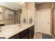 Well-lit bathroom featuring tile shower, granite countertops, and vanity with sink at 2256 Long Bow Chase Nw, Kennesaw, GA 30144