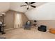 Spacious bonus room offering versatile usage with a ceiling fan, cozy seating, and natural light at 2256 Long Bow Chase Nw, Kennesaw, GA 30144