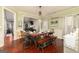 Dining room with wood floors, green walls, and a decorative dining table at 2256 Long Bow Chase Nw, Kennesaw, GA 30144
