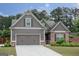 Charming single-Gathering home featuring a 2-car garage, brick accents, and well-manicured landscaping at 2256 Long Bow Chase Nw, Kennesaw, GA 30144