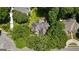 Aerial view of a house surrounded by lush greenery in a residential neighborhood at 162 Daltree Ct, Marietta, GA 30068