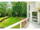 View of the large landscaped backyard from the property's upper balcony at 162 Daltree Ct, Marietta, GA 30068