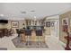 Basement bar area with seating, a kitchenette, and plenty of space for entertaining guests at 162 Daltree Ct, Marietta, GA 30068