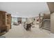 Finished basement featuring a stone fireplace, built-in shelving, and comfortable seating at 162 Daltree Ct, Marietta, GA 30068