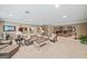 Spacious basement area with a wet bar, comfortable seating, and ample room for entertaining at 162 Daltree Ct, Marietta, GA 30068