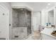 Bathroom featuring glass shower, white cabinets, and modern fixtures at 162 Daltree Ct, Marietta, GA 30068