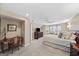 Spacious bedroom with a ceiling fan, desk, large bed, and bright natural light at 162 Daltree Ct, Marietta, GA 30068