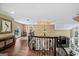 Elegant foyer with curved staircase, hardwood floors, and decorative chandelier, creating a grand entrance at 162 Daltree Ct, Marietta, GA 30068