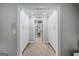 Hallway featuring built-in storage cabinets, providing ample space for organization and access to other rooms at 162 Daltree Ct, Marietta, GA 30068