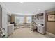 Well-lit home office with custom built-ins, a cozy window seat, and a functional workspace at 162 Daltree Ct, Marietta, GA 30068