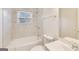 Bright bathroom features white vanity, a window and updated fixtures at 500 Pomona Circle Sw, Atlanta, GA 30315