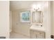Updated bathroom with vanity, and natural light from the window at 500 Pomona Circle Sw, Atlanta, GA 30315