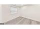 Bright room showcasing gray vinyl flooring and plenty of light at 500 Pomona Circle Sw, Atlanta, GA 30315