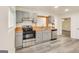 Charming kitchen with gray cabinets, stainless steel appliances and wood countertop at 500 Pomona Circle Sw, Atlanta, GA 30315