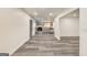 Bright open-concept living space flows into a kitchen with gray cabinets and stainless steel appliances at 500 Pomona Circle Sw, Atlanta, GA 30315