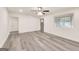 Inviting living room featuring lots of natural light, ceiling fan and stylish modern flooring at 500 Pomona Circle Sw, Atlanta, GA 30315