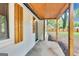 Covered front porch featuring wood ceiling and door to the home at 500 Pomona Circle Sw, Atlanta, GA 30315