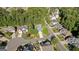 Aerial view of the neighborhood and landscaping, enhancing the property's curb appeal and desirability at 1210 Magnolia Park Cir, Cumming, GA 30040