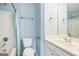 Bathroom featuring a white vanity, toilet, and shower with tub at 1210 Magnolia Park Cir, Cumming, GA 30040