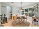 Dining room with warm lighting and a large window, perfect for meals at 1210 Magnolia Park Cir, Cumming, GA 30040