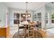 Inviting dining room with natural light and a view of the outdoors at 1210 Magnolia Park Cir, Cumming, GA 30040