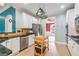 Well-appointed kitchen featuring stainless steel appliances, sleek countertops, and ample cabinet space at 1210 Magnolia Park Cir, Cumming, GA 30040