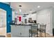 Modern kitchen with stainless steel appliances, granite countertops, and a convenient breakfast bar at 1210 Magnolia Park Cir, Cumming, GA 30040
