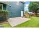Enjoy the outdoor space with a concrete patio and mature landscaping, perfect for relaxing or entertaining at 1210 Magnolia Park Cir, Cumming, GA 30040