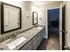 Bathroom featuring double vanity sinks and granite countertops at 101 High Bluff Trl, Carrollton, GA 30116