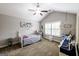 Comfortable bedroom featuring a vaulted ceiling, fan and a hammock chair at 101 High Bluff Trl, Carrollton, GA 30116