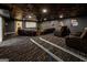 Finished home theater boasts tiered seating, a large screen, and comfortable leather recliners at 101 High Bluff Trl, Carrollton, GA 30116
