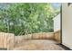 Spacious backyard with a wooden fence, perfect for outdoor activities and gardening at 131 Turning Pt, Stockbridge, GA 30281