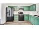 Well-lit kitchen features modern appliances, bright countertops, stylish cabinets, and wood-look flooring at 131 Turning Pt, Stockbridge, GA 30281