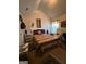 Vaulted bedroom with a comfy bed, carpet flooring and lots of natural light at 2208 Crossrail Dr, Atlanta, GA 30349