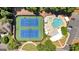 Aerial view of community amenities including tennis courts and swimming pool at 3400 Dencrest Se Ct, Smyrna, GA 30080