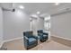 Finished basement area with modern flooring and comfortable seating at 3400 Dencrest Se Ct, Smyrna, GA 30080