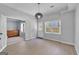 Bright bedroom with hard wood floors, neutral color, and modern lighting at 3400 Dencrest Se Ct, Smyrna, GA 30080
